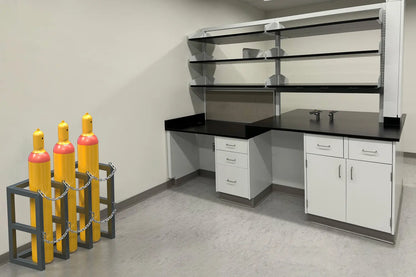 laboratory with lab benches, cabinets, tables and gas cylinder racks